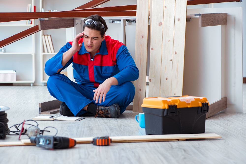 Construction Worker Feeling Sick