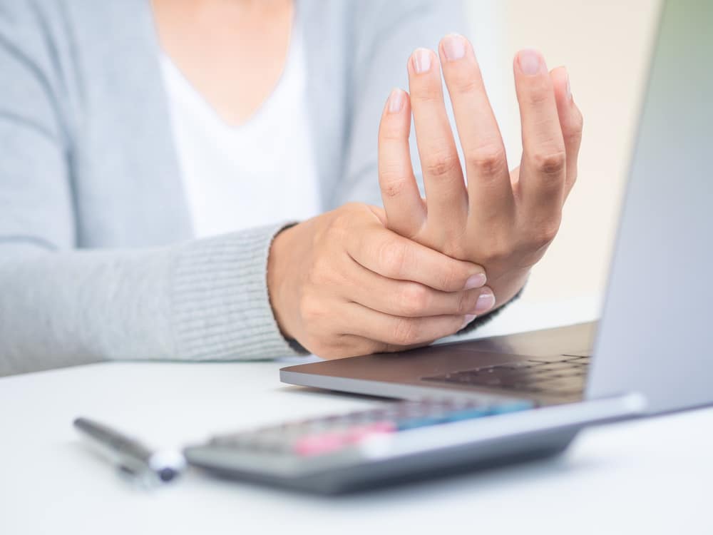 Office Worker With RSI Symptoms