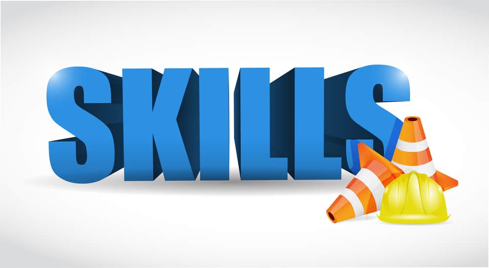 A construction cone with the word skills on it.