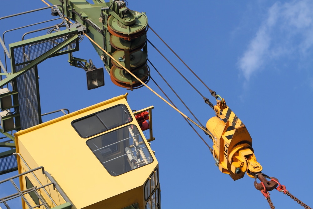 The crane is yellow.