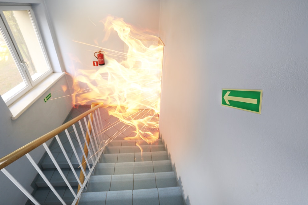 A stairway with a fire coming out of it.