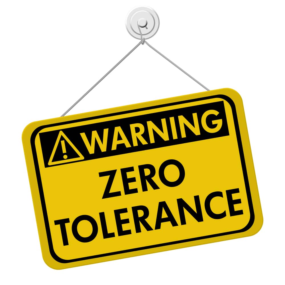 A warning sign that says zero tolerance.